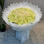 Vase of white baby Roses 1
