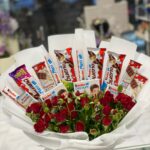 A bouquet of sweets with baby roses